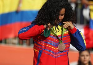 . Rio De Janeiro (Brazil), 19/08/2016.- Bronze medalist Stefany Hernandez of Venezuela reacts on the podium during the medal ceremony for the women's BMX Cycling competition of the Rio 2016 Olympic Games at the Olympic BMX Centre in Rio de Janeiro, Brazil, 19 August 2016. (Brasil, Ciclismo, Ciclismo bmx) EFE/EPA/FAZRY ISMAIL